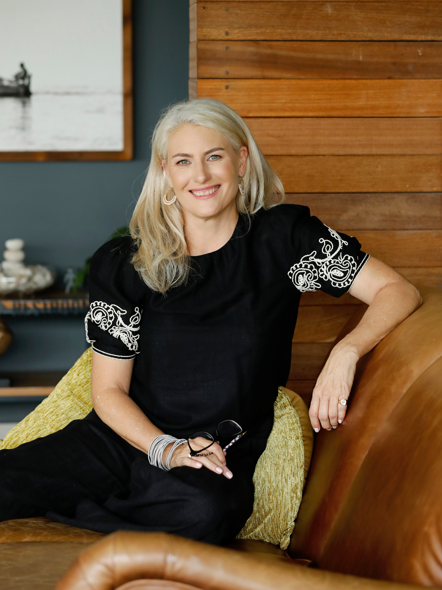 Kathrine Bekker-Smith seated in a modern interior
